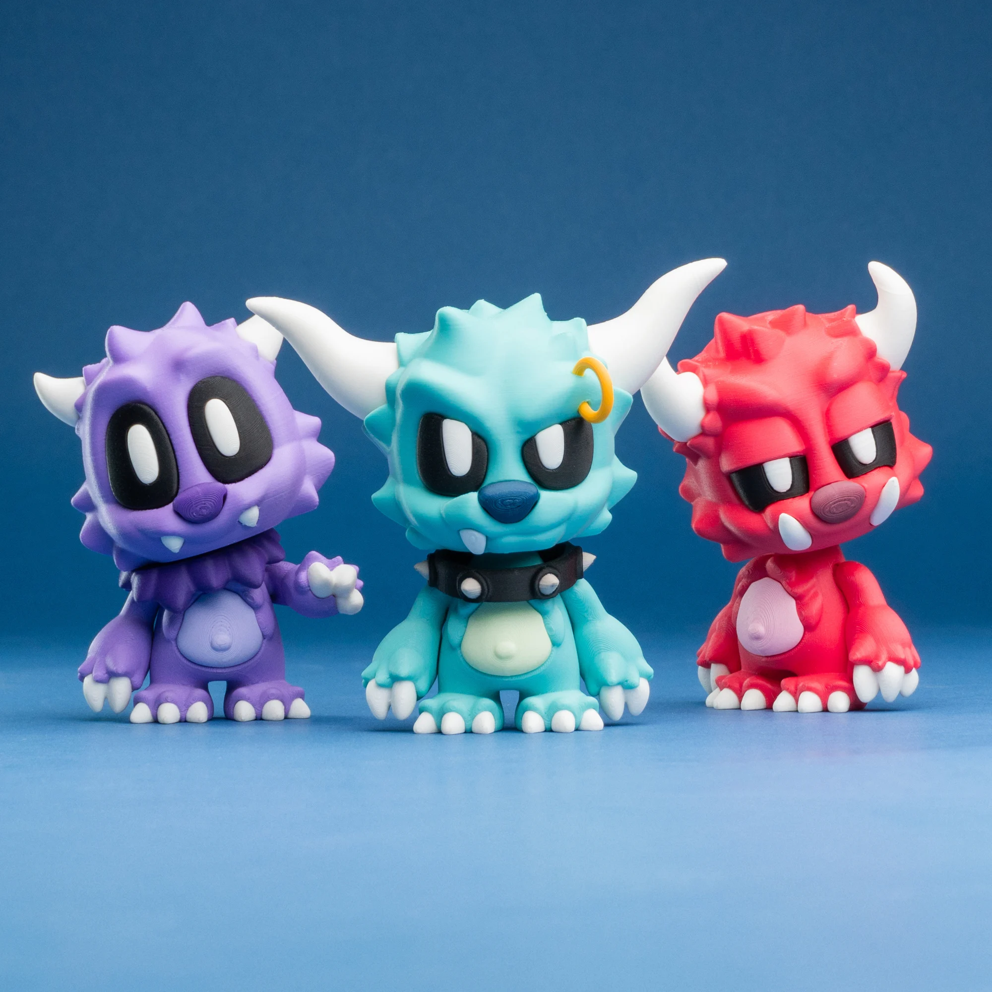 Three colourful Blob Monsters posable figures
